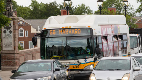 MBTA bus driving over bridge in traffic
