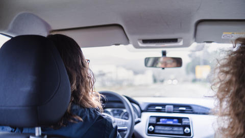 Two women carpooling