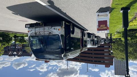 row of shuttles lined up for commencement