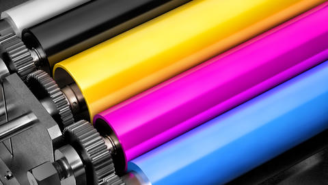 Rolls of print colors yellow, pink and blue