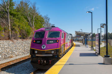 Commuter rail train stopped at a station platform