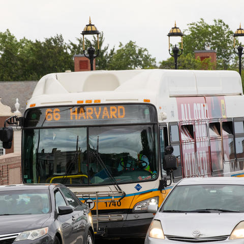 MBTA bus driving over bridge in traffic