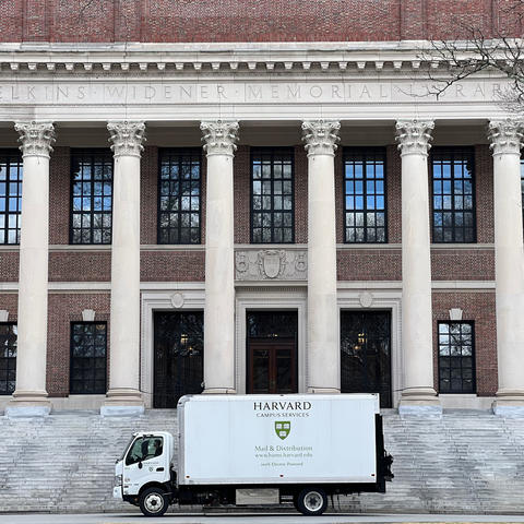 HUMS EV Truck parked in front of Widener Library