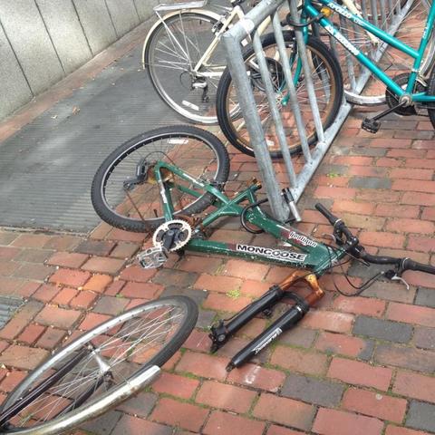 Missing wheel, seat and rusted components