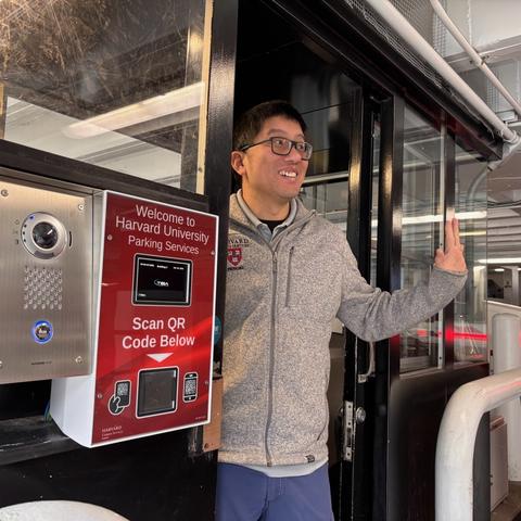 Parking monitor greeting drivers at garage entry
