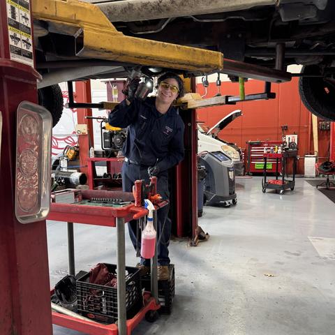 mechanic under vehicle