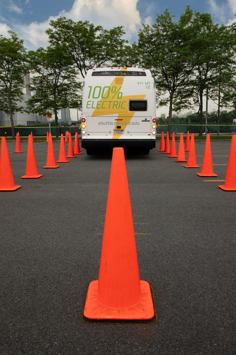Shuttle driving through cones