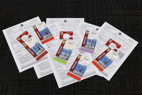 parking permits and applications sprawled across floor